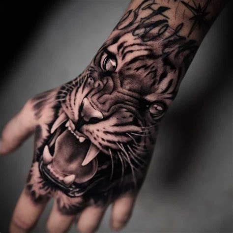 40 Tantalizing Tiger Tattoo Ideas For Men And Women In 2022 Tiger Hand