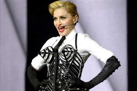 madonna exposes teenage fan s breast on stage video