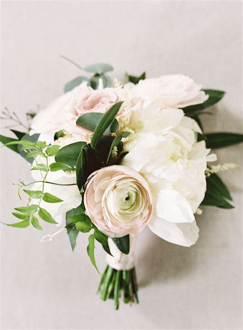 Rounded Clutch Bouquets Of Cream Hydrangea Blush Akito Roses Ivory