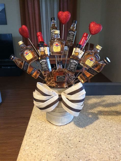 My friend asked me to make her son's 5th birthday cake, and when i asked her what he wanted on it, she said, oh, just put on gobs and gobs of candy. instead of piling on candy haphazardly, i thought it should look like the candy land board game. Men bouquet. Perfect for Valentines Day. | Liquor gifts ...