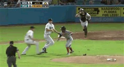 Video Nyjer Morgan Charges Mound Gets Clotheslined Walks Off Field