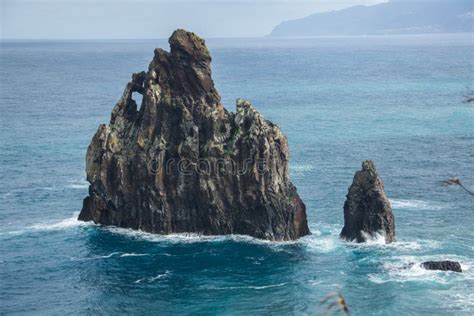 Black Rock In The Ocean And Coastline Of Madeira Island Stock Image