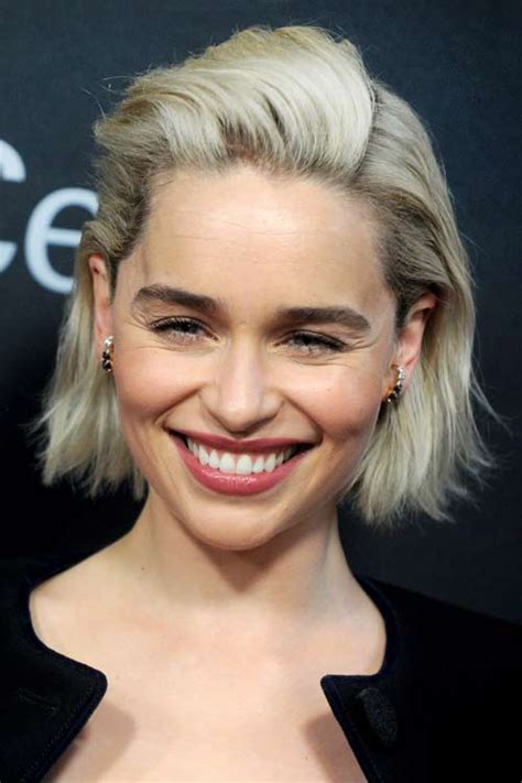 Emilia Clarke Wavy Platinum Blonde Dark Roots Hairstyle Steal Her Style