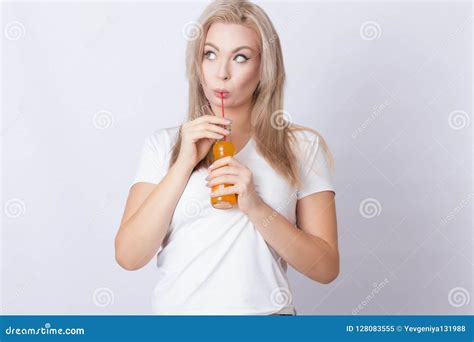 Blonde Woman With Orange Soda In Her Hands Stock Image Image Of