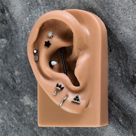 Black And Silver Ear Piercings 🖤 In 2020 Ear Piercings Body Jewelry
