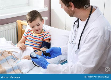 Doctor Checking Child`s Blood Pressure Stock Photo Image Of Disease