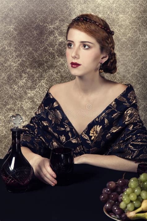 What to gift a rich woman. Portrait Of Beautiful Rich Women With Grapes. Stock Photo ...