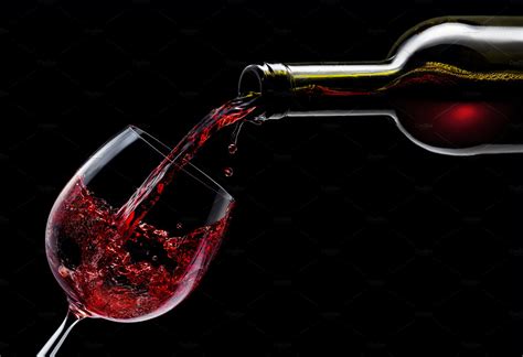 Red Wine Is Poured Into A Wine Glass High Quality Food Images ~ Creative Market