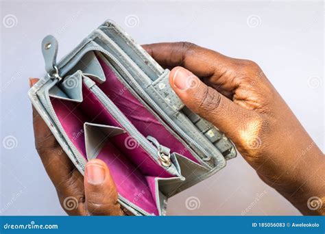 Poor African Woman Hand Open Empty Purse Looking For Money Having Problem Bankrupt Broke Stock