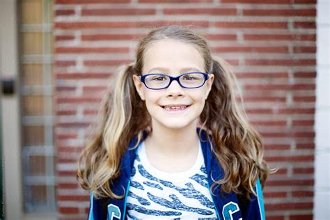Portrait Of Girl Ready For First Day Of Grade School By Stocksy