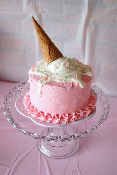 melting ice cream cone 1st birthday cake ~~ ice cream made with rice krispie treats and wilton