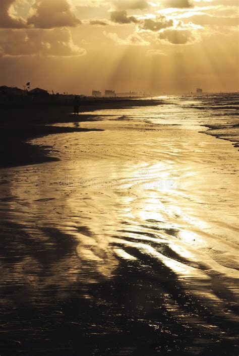 Sunset At Tropical Beach Ocean Sandy Coast Under Evening Sun Stock