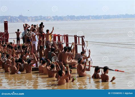 People Take Bath In The Holy River Ganges In Assi Ghat Editorial Image