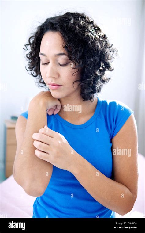 Itching In A Woman Stock Photo Alamy