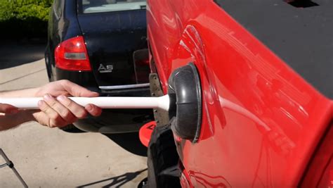Using Boiling Water And A Plunger To Remove Car Dents Does It Work
