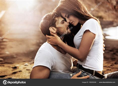 Handsome Man Hugging His Sensual Girlfriend — Stock Photo © Konradbak