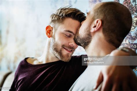 Gay Man Kissing His Partner On The Head High Res Stock Photo Getty Images