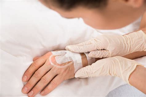 Close Up Of A Iv Drip In Patient S Hand Stock Photo Image Of Care