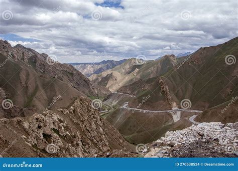 The Rugged And Dangerous Mountain Road On The Mountain Stock Photo