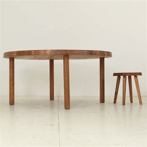 Round rustic dining table with walnut finish and robust base. Extra Large Pierre Chapo Round Dining Table, TO2E For Sale at 1stdibs