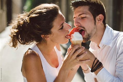 Young Couple Eating Ice Cream Together Stocksy United