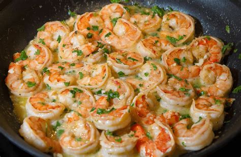 Plump shrimp sautéed in a rich & buttery, bright & lemony, herb & garlicky white wine scampi sauce, and tossed with linguine pasta. Shrimp Scampi Recipe | SparkRecipes