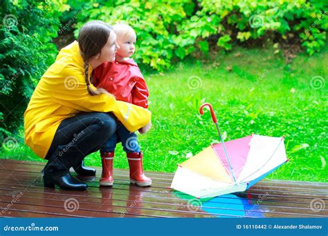 Mother And Daughter Outdoors At Rainy Day Stock Photo Image Of