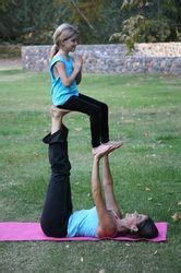 Keep your spine long and your skull on the floor without arching your neck or lower back. Family Acro Yoga - Kids World Yoga | Acro yoga poses, Partner yoga poses