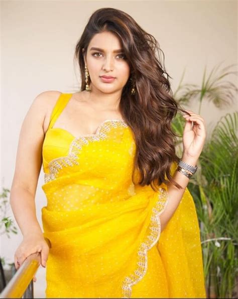 nidhhi agerwal in yellow saree for movie promotions actress album