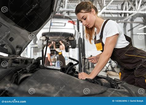Pretty Girl Working As Mechanic In Autoservice Stock Photo Image Of