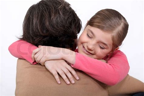 A Mother Hugging Her Daughter Stock Image Colourbox