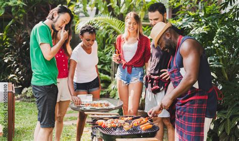 Group Of Diversity People Having Barbecuebarbeque Party At Home