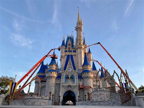 Photos Cinderella Castle Makeover Painting Takes Drastic Pink And Gold