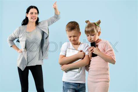 Angry Mother Scolding Her Son And Stock Image Colourbox