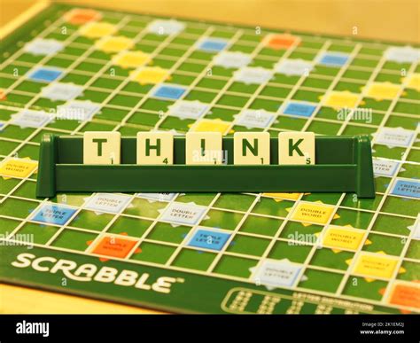 Colorful Close Up Of Crossing Words On Scrabble Game Board Word Think