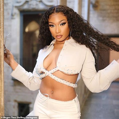 Megan Thee Stallion Shows Off Her Ample Cleavage And Toned Midriff In A