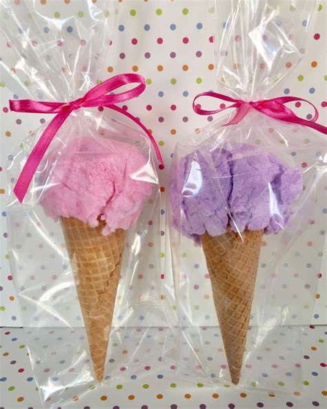 Two Ice Cream Cones Are Wrapped In Plastic
