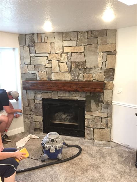 Stone Fireplace Wall With 8x8 Floating Cedar Mantel Floating