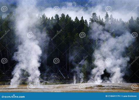 Steam Rising From Geysers And Hot Springs In Yellowstone National Park