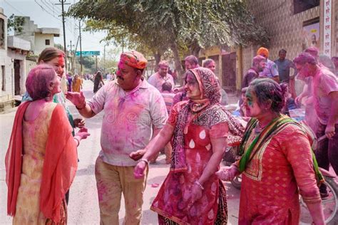 Indian People In Different Colours Celebrate Traditional Holi Festival