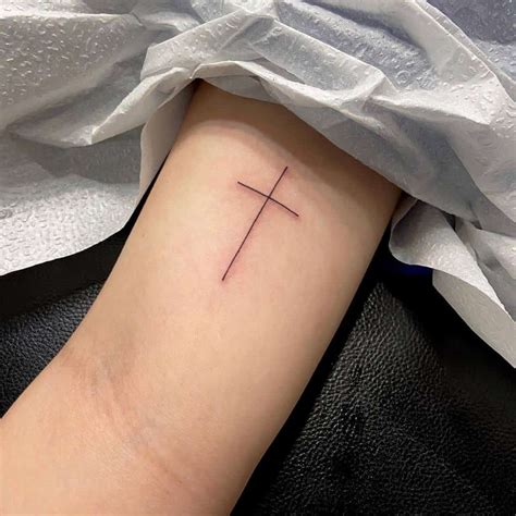 Small Cross Tattoo Ideas For Women