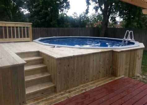 It's a quicker and simpler option for those who don't want to turn their backyard into a construction site by digging a huge hole. above-ground-pool-deck - Houston Custom Decks & Pergola