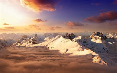 Mountain Covered With White Snow With Clouds View During Golden Hour Hd