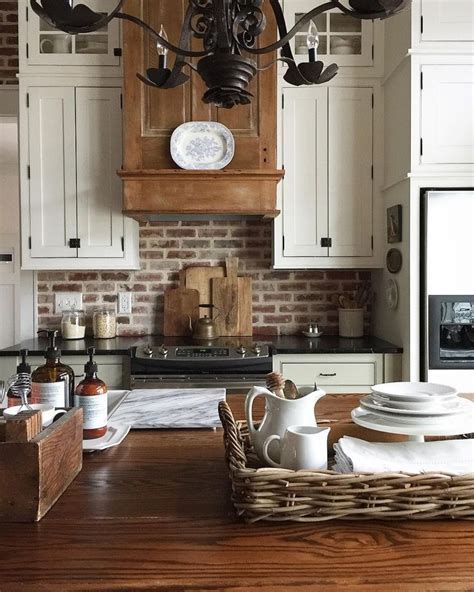 Antique plaques wall clock, 20, white Kitchen with custom wood vent hood and beautiful brick ...