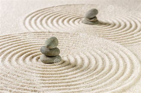 Zen Garden With Stacked Stones And Sand With Circles Stock Photo