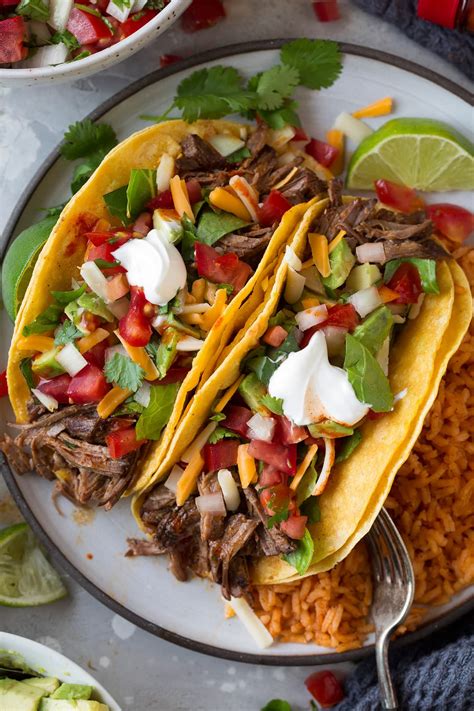 These tacos are so delicious you'll definitely go back for seconds. Slow Cooker Shredded Beef Tacos - Cooking Classy