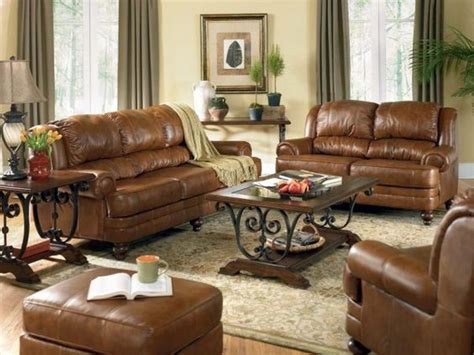There's leather furniture with a very contemporary modern look, a lush elegant look, or a rather rustic look. Brown Leather Sofa Decorating Ideas | iinterior design for a living room with a fireplace ...