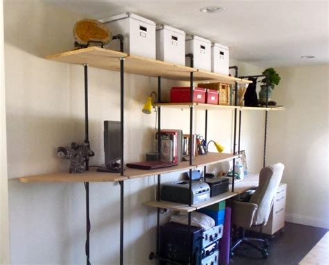 The pipe shelving frame is only connected horizontally by the wood shelving. Go Creative with DIY Wall Shelves in Your Interior - HomesFeed