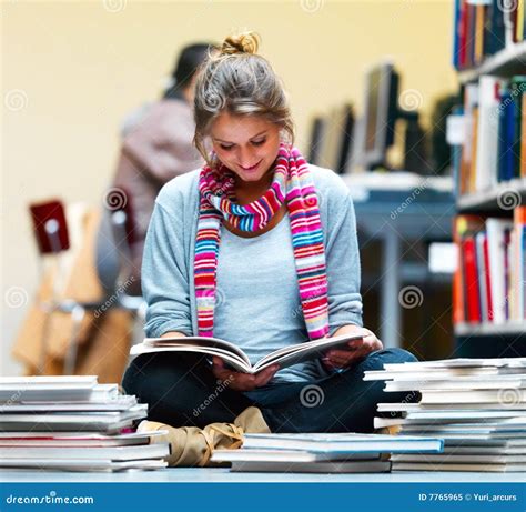 Young Lady Sitting And Reading Book In Library Stock Image Image Of