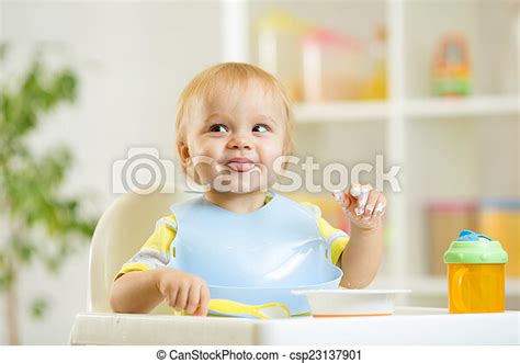 Smiling Baby Kid Boy Eating Itself With Spoon Smiling Cute Baby Kid